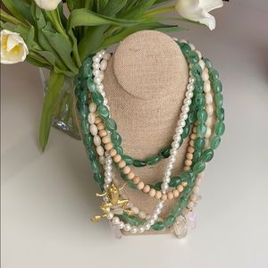 Multi-strand statement necklace with frog charm